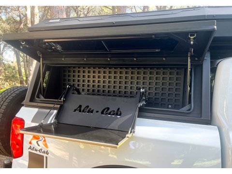 Tablette pliante pour compartiment latéral hard-top Alu-Cab