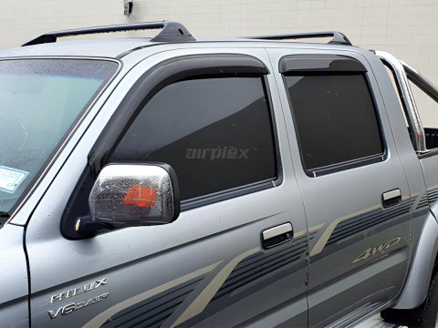 Jeu 4 déflecteurs vitre avant et arrière Toyota Hilux 1998-2004