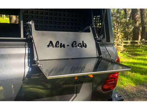 Tablette pliante pour compartiment latéral hard-top Alu-Cab