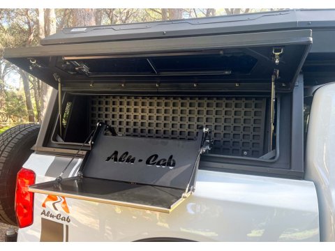 Tablette pliante pour compartiment latéral hard-top Alu-Cab